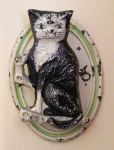Click to view Antique Cat Cast Iron Doorkncoker photos