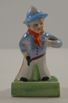 Click to view Antique Cowboy w/ Pistol Toothbrush Holder photos