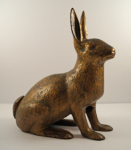 Click to view Rare Sitting Rabbit Cast Iron Doorstop photos