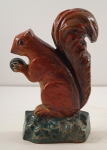 Click to view Antique Squirrel Cast Iron Blodgett Doorstop photos