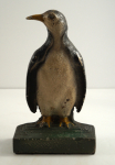 Click to view Antique Penguin Bird Cast Iron Doorstop photos