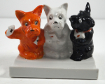Click to view Three Scottie Dog Porcelain Toothbrush Holder photos