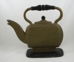 Click to view Teapot Kettle Doorstop photos