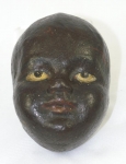 Click to view Black Face of Child Door Stop photos