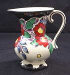 Click to view Decorated Czech Art Pottery Pitcher photos