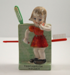 Thumbnail Image: Girl Brushing Teeth Toothbrush Holder