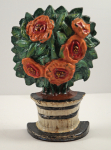 Click to view Antique Flowers in Pot Cast Iron Doorstop photos