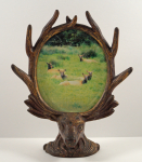 Click to view Antique Elk Cast Iron Frame 1920s photos