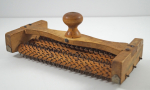 Click to view Antique Primitive Cracker Roller  photos